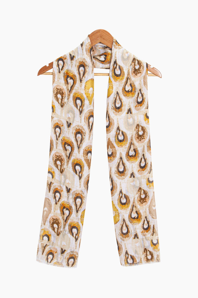 adler-lightweight-scarf-orange-gold-teardrop-draped-around-coat-hanger