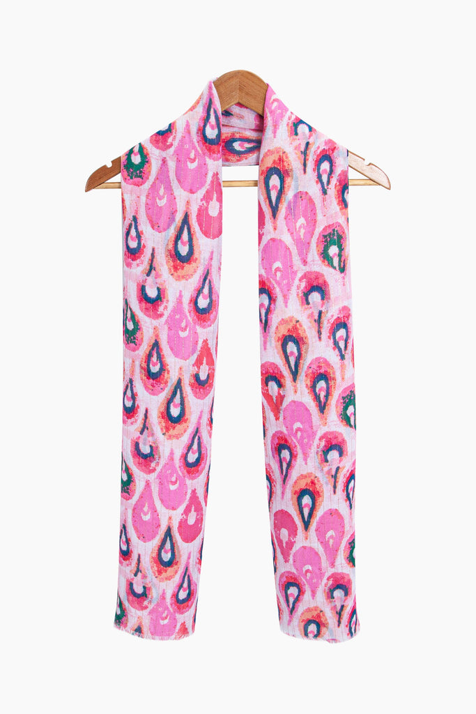 adler-lightweight-scarf-pink-gold-teardrop-draped-around-coathanger