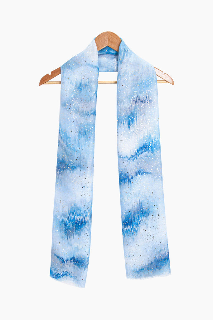 aurora-lightweight-scarf-blue-ombre-metallic-on-coat-hanger