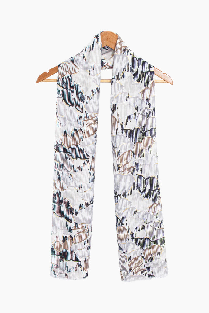 etta-lightweight-scarf-black-abstract-print-on-coat-hanger