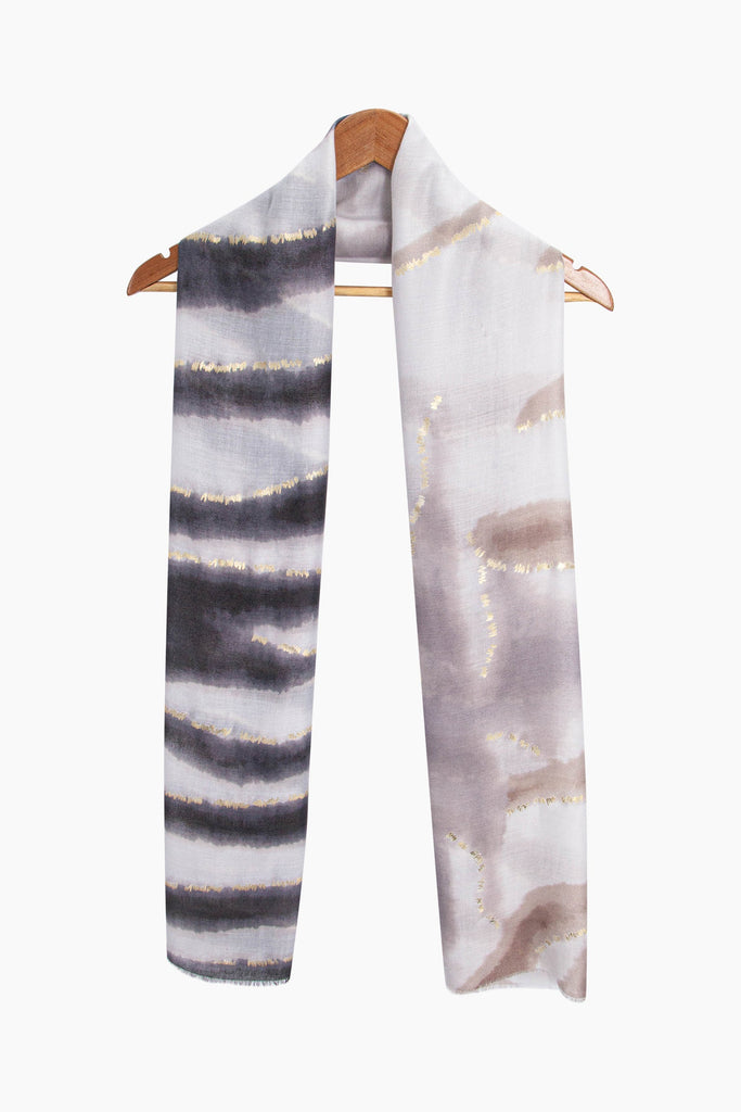 river-lightweight-scarf-black-gold-metallic-stripe-draped-around-coat-hanger