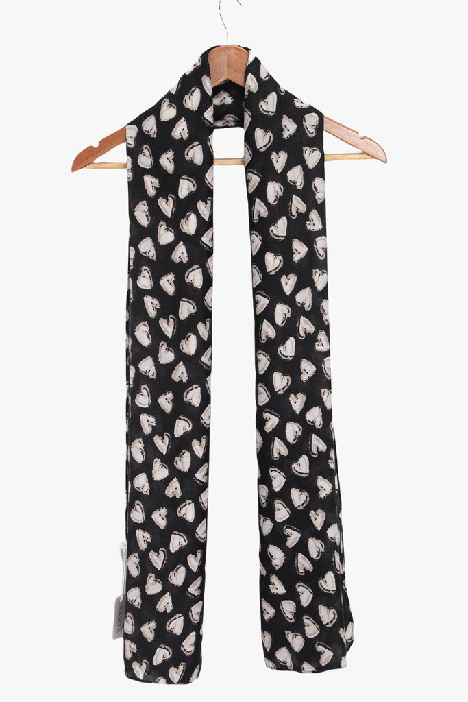 kara-black-white-hearts-lightweight-scarf-draped-coat-hanger