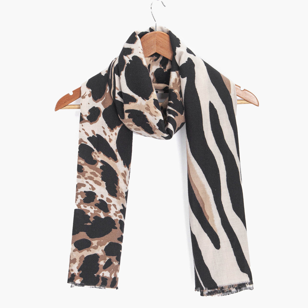 mabel-cream-animal-print-lightweight-scarf-draped-on-coat-hanger