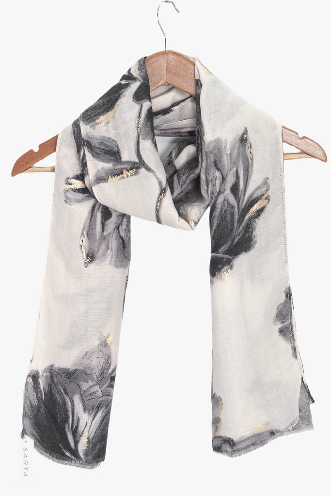 eleanor-grey-abstract-floral-lightweight-scarf-draped-on-coat-hanger