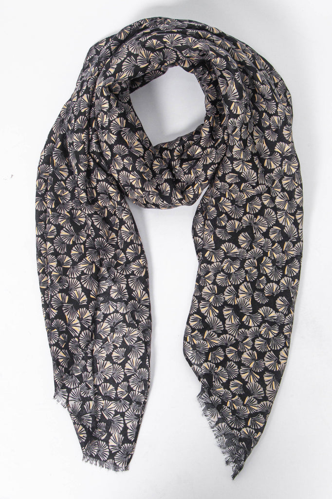 black lightweight scarf with an all over retro fan print pattern, the fans are open and have metallic foil highlights