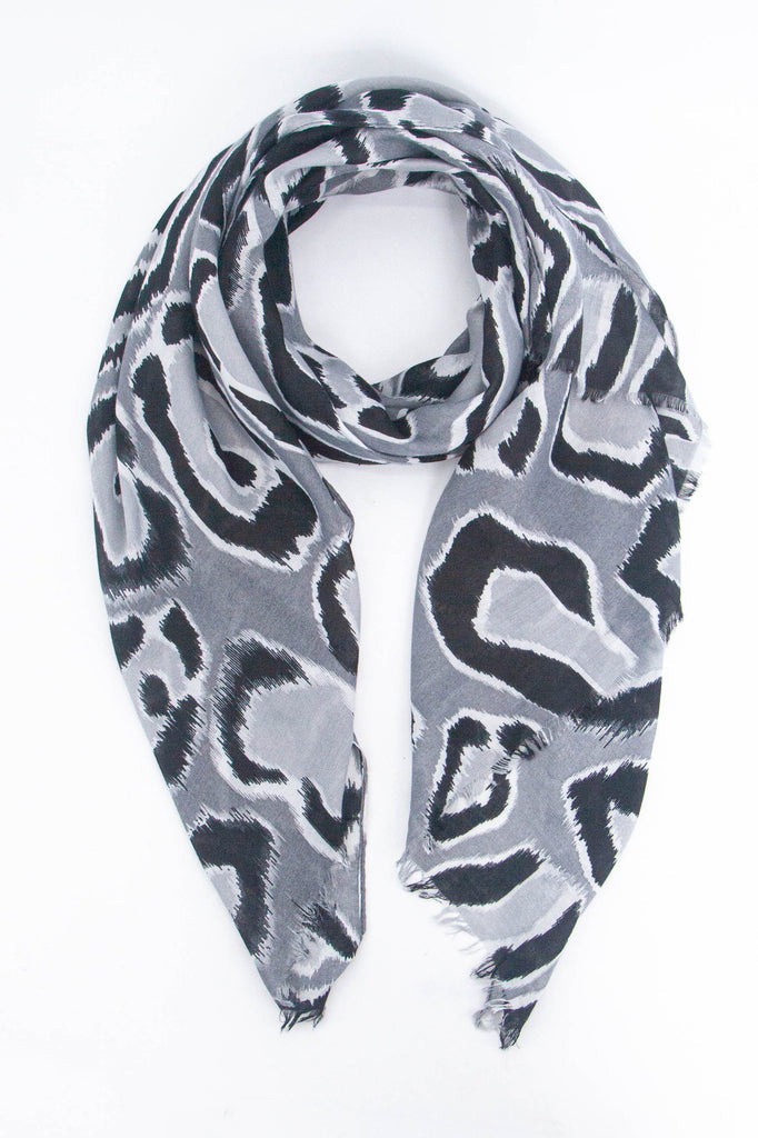 grey lightweight scarf with a large bold black leopard print pattern