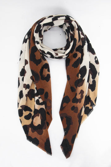 camel, brown and neutral beige ombre scarf with a bold large black leopard print pattern all over