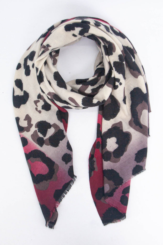 red, pink and cream ombre scarf with a bold large black leopard print pattern all over