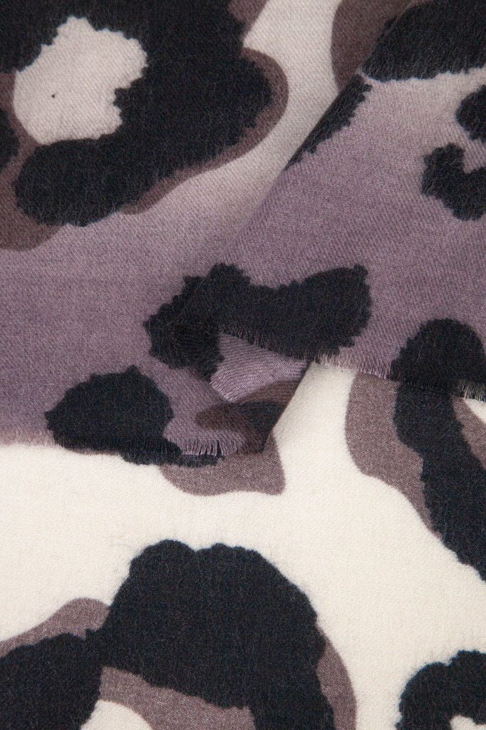 close up of the soft viscose fabric, the neutral and cream colourways are clearly visible