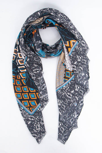 grey, blue and orange scarf with contrasting floral and geometric patterns 