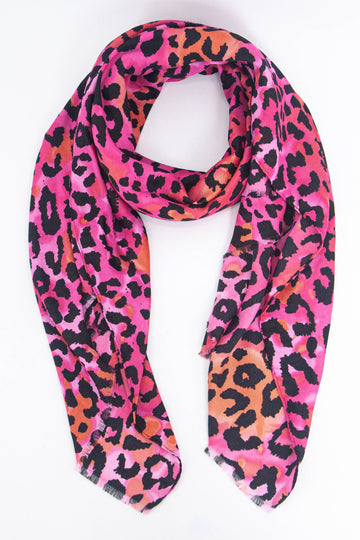 fuchsia pink and orange ombre scarf with an all over black leopard print pattern