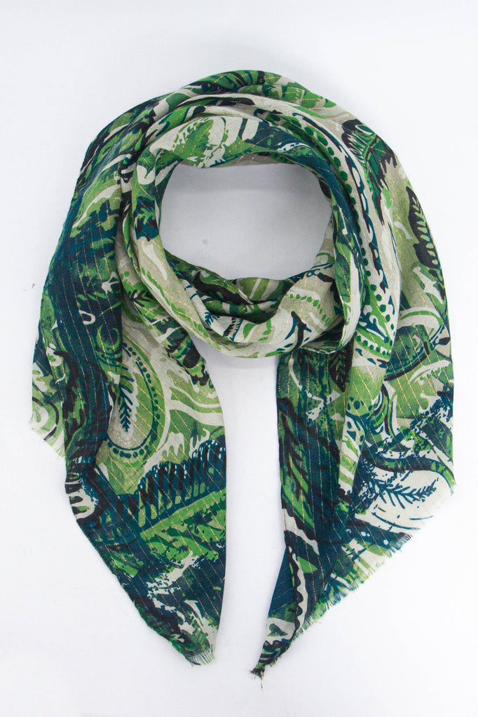 a green tone marble effect paisely print scarf with a subtle gold metallic stripe running throughout