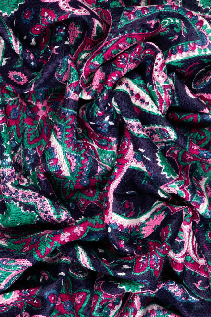 close up of the soft viscose fabric, the navy blue and pink colourways are clearly visible