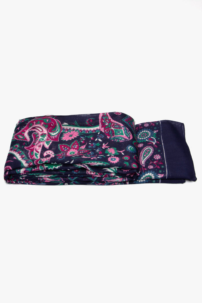 side view of the scarf when folded, showing the texture and thickness of the material. this scarf is lightweight