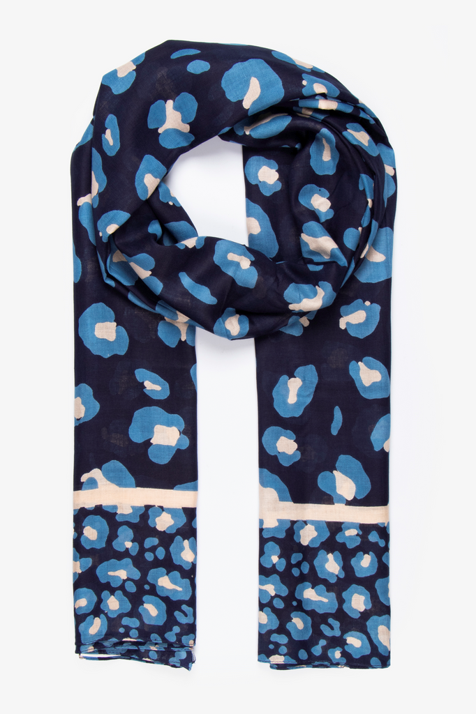 navy blue scarf with a light blue leopard print pattern, border stripe and bordered animal print pattern