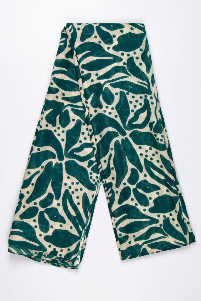 showing the scarf folded, the green and cream floral pattern is bold and shown to cover the entire piece.