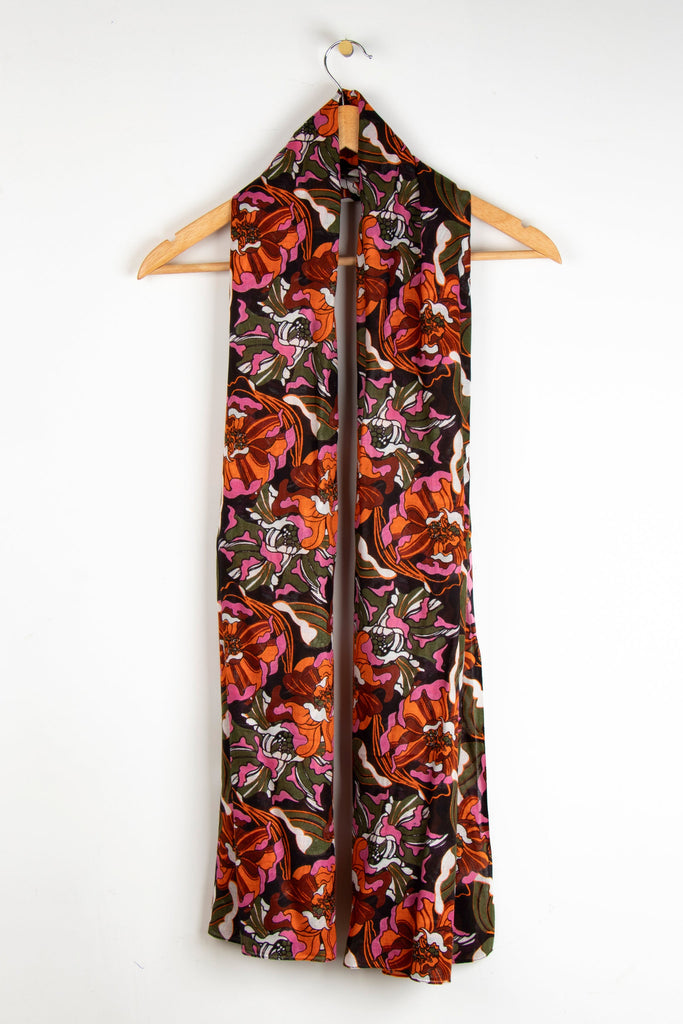 close up of the soft viscose fabric, the khaki and orange colourways are clearly visible