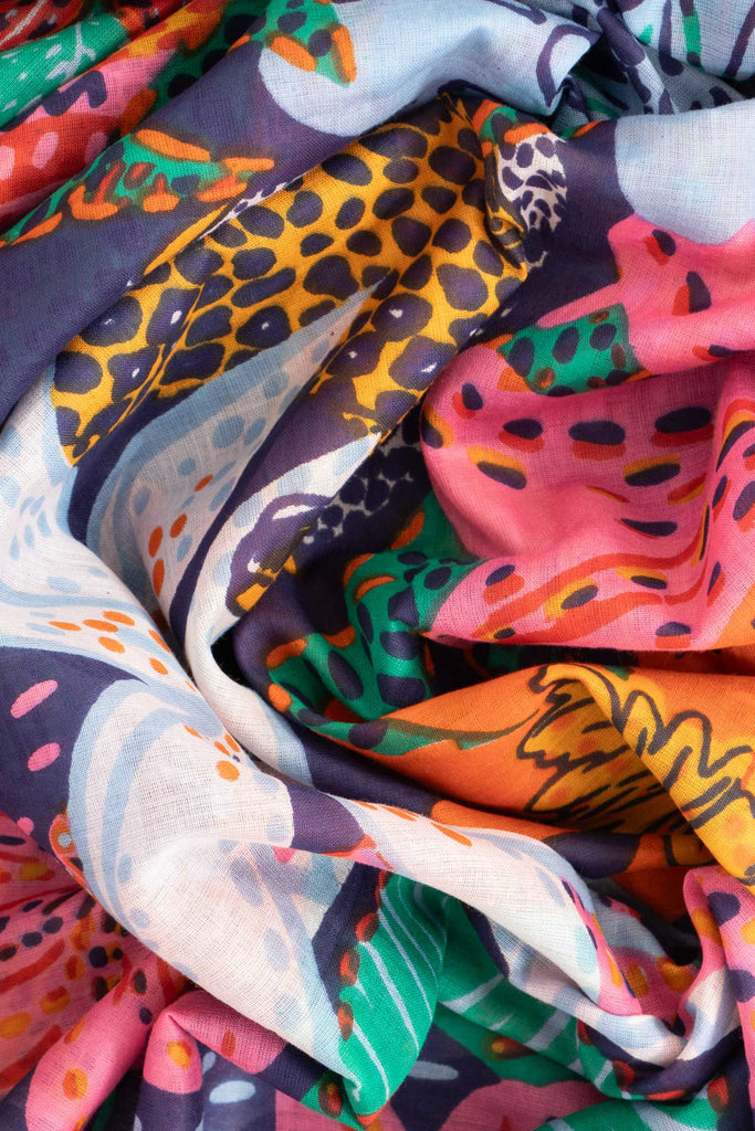 amara-lightweight-cotton-scarf-navy-blue-floral-jungle-print-close-up-soft-material