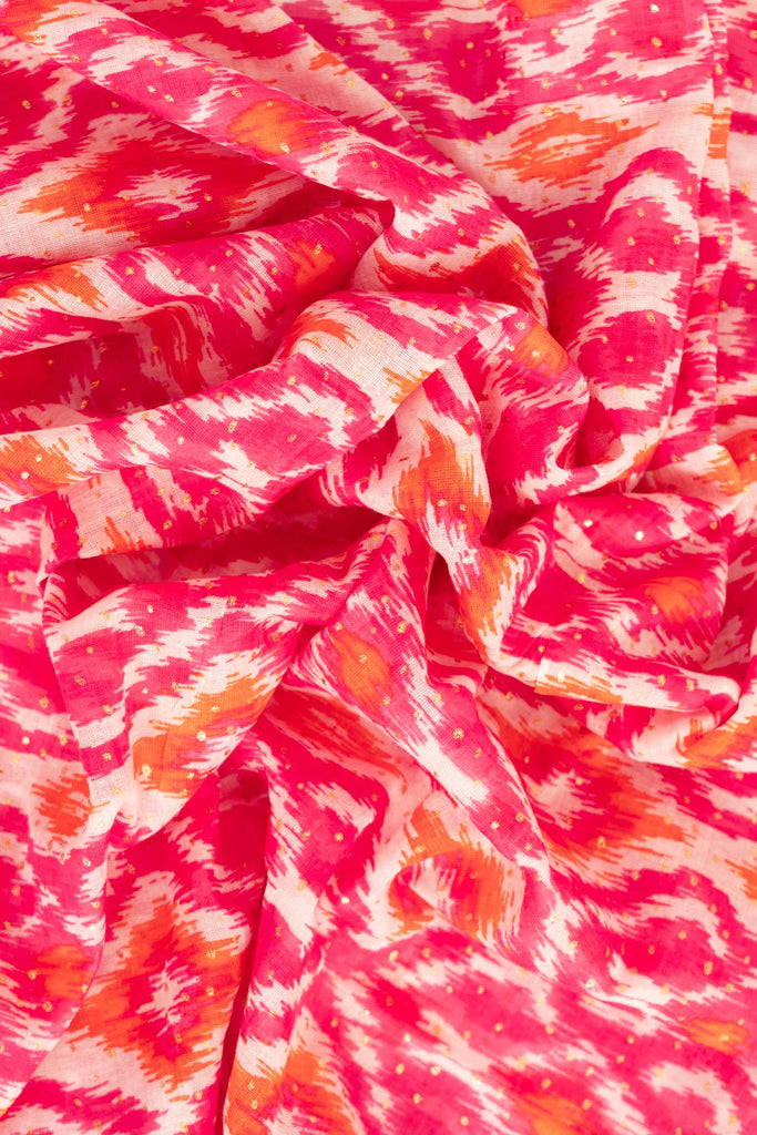 rani-lightweight-cotton-scarf-pink-orange-aztec-print-close-up-soft-fabric