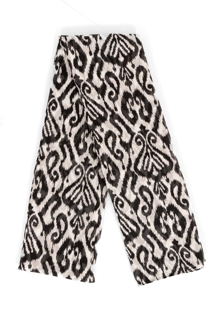 saffron-lightweight-cotton-scarf-black-damask-print-folded-showing-pattern-covering-entire-design