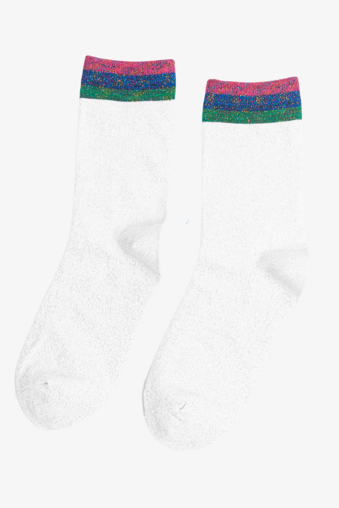 showing the rainbow glitter effect on the cuff and the silver glitter on the body of the socks