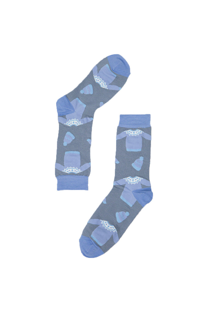 grey socks with a pattern of xmas jumpers and knitted hats