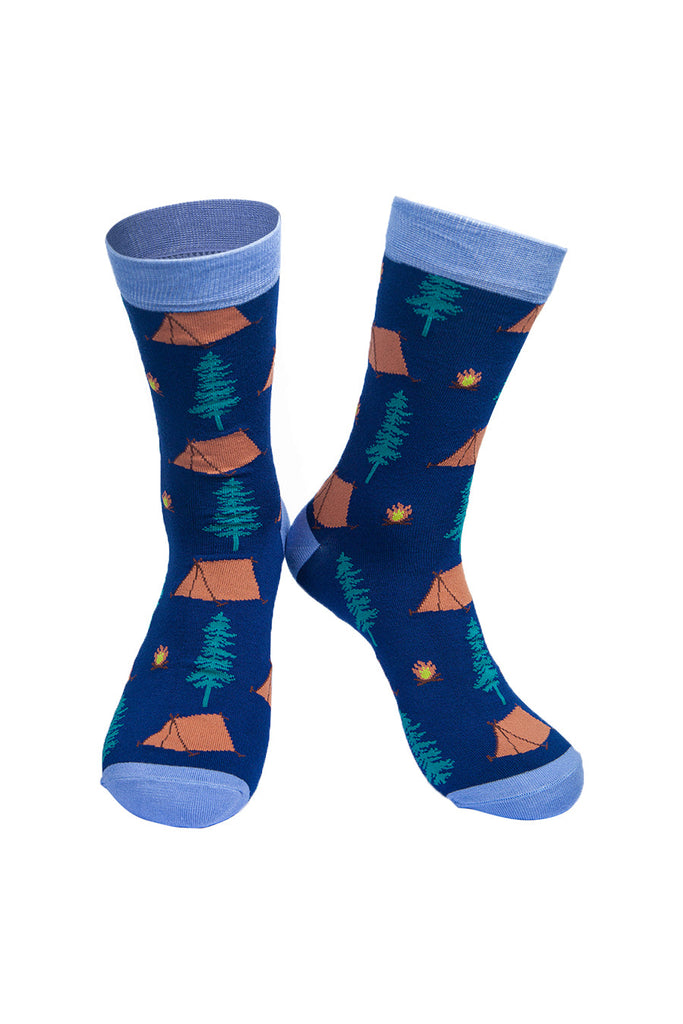 blue bamboo socks with a pattern of tents, campfires and tress all over 