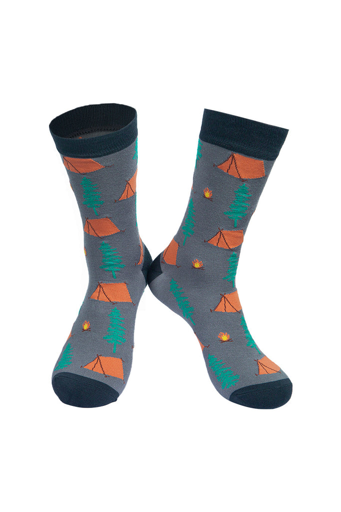 grey bamboo socks with a pattern of tents, campfires and tress all over 