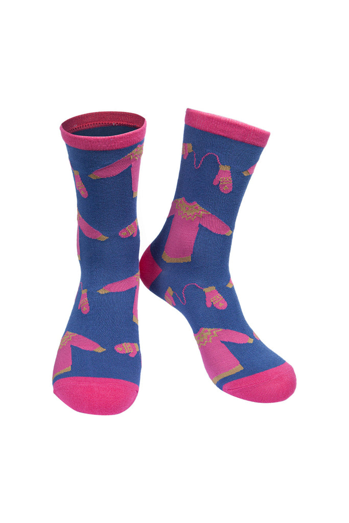 blue socks with a fuchsia pink winter  jumpers, and knitted glove pattern