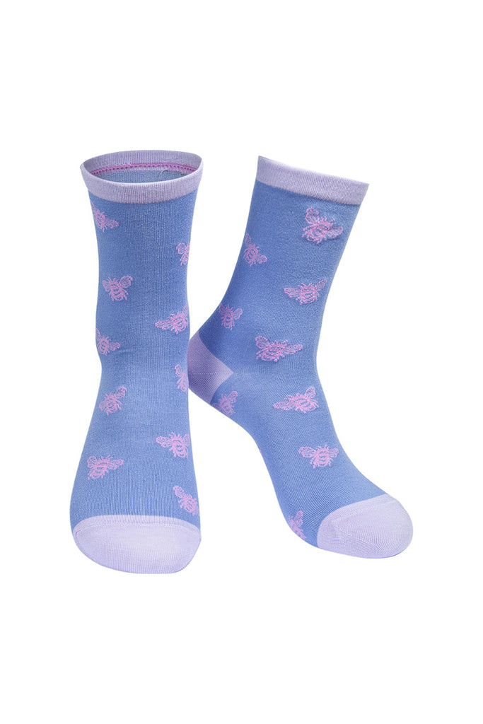 lilac socks with a lilac bee pattern all over