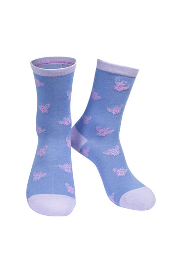 lilac socks with a lilac bee pattern all over