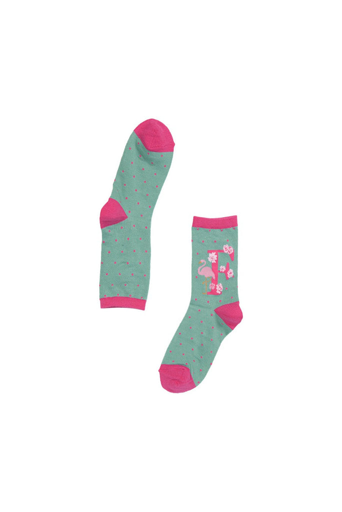 showing that the letter f is visible only on the outer edge of the socks