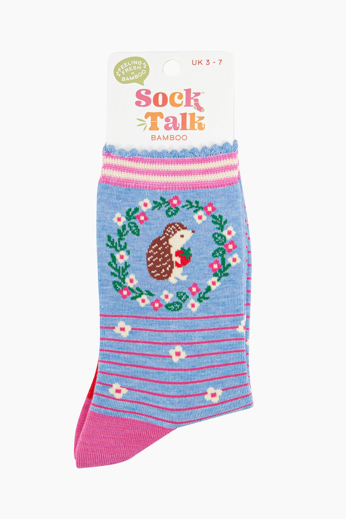 women's light blue hedgehog and strawberry wreath ankle socks in their sock talk packaging, the socks are a uk size 3-7.
