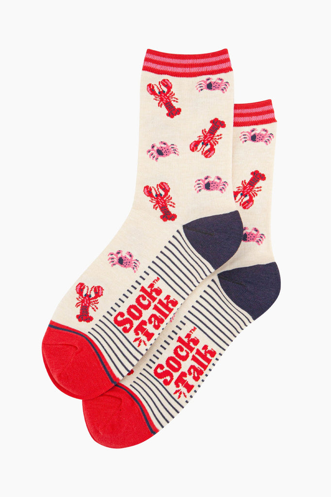 womens-bamboo-socks-cream-lobster-and-crab-laying-flat-showing-the-all-over-pattern-of-red-lobsters-and-crabs