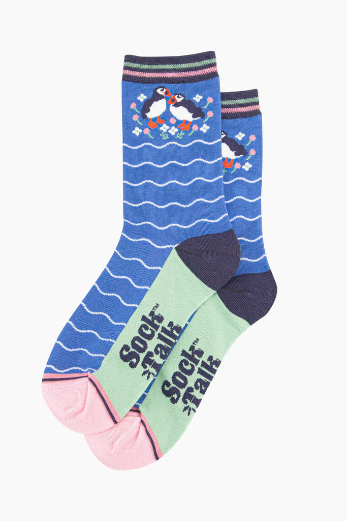 womens-bamboo-socks-blue-puffins-and-flowers-laying-flat-pair-of-birds-wildflowers