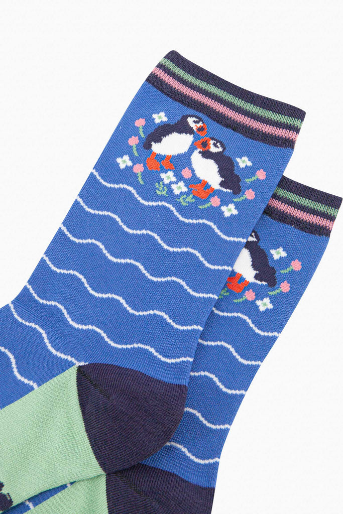 womens-bamboo-socks-blue-puffins-and-flowers-close-up-black-white-birds-orange-beaks-wildflowers