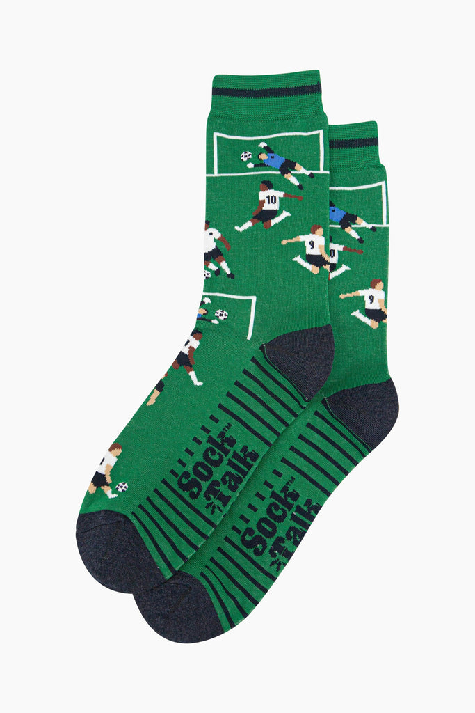 mens-bamboo-socks-green-football-players-laying-flat-both-goals-visble-goal-being-scored