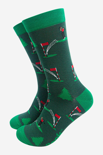 green bamboo socks featuring a golf scene with a golfer on the green