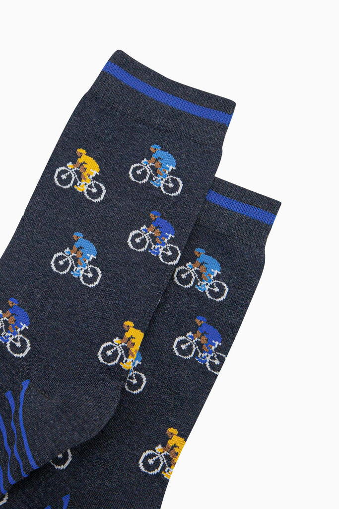 mens-bamboo-socks-navy-cyclists-close-up-bikers-wearing-yellow-jersey-blue-jerseys-road-race-competition