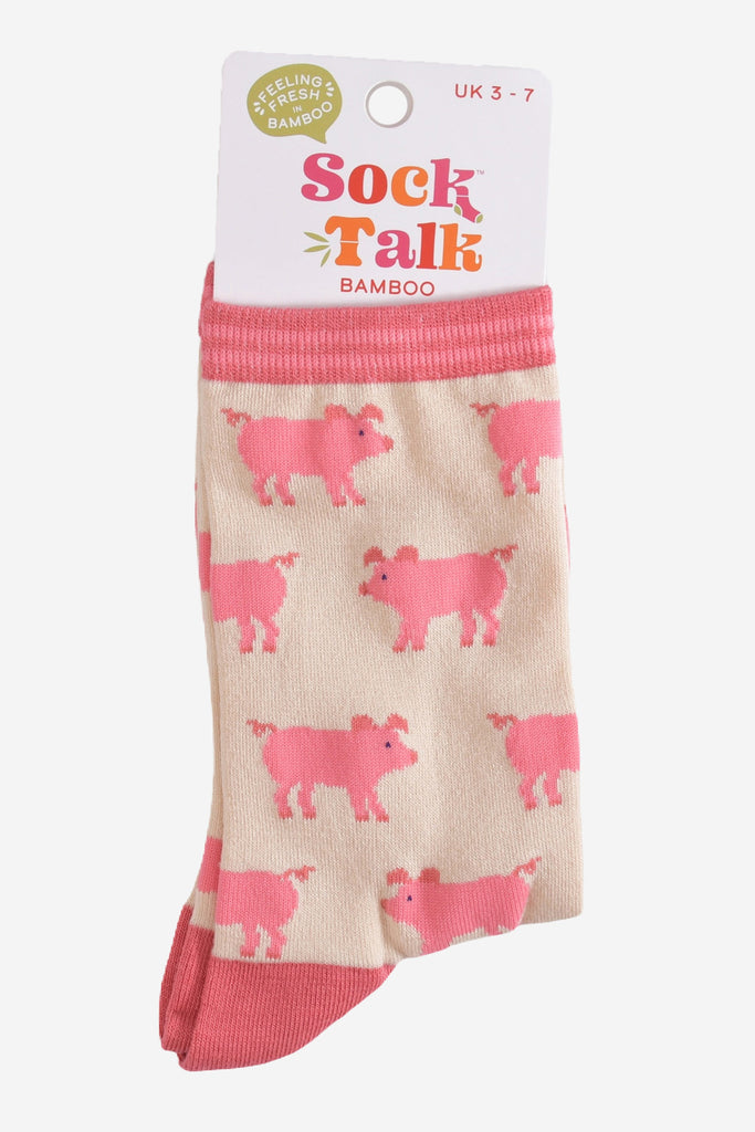 cream and pink pig bamboo socks in their sock talk packaging, these socks are a uk size 3-7
