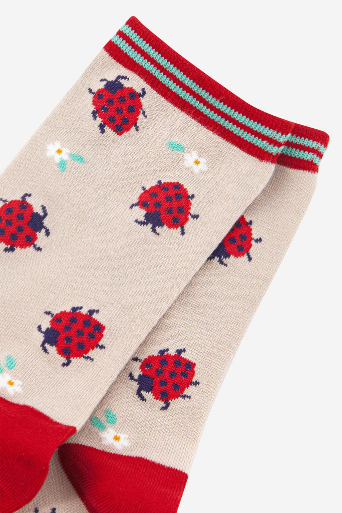 close up of the red ladybug pattern on the bamboo ankle socks