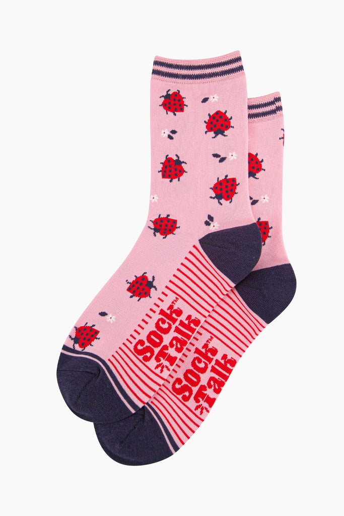 womens-bamboo-socks-pink-ladybird-laying-flat-red-ladybird-pattern-covers-the-design