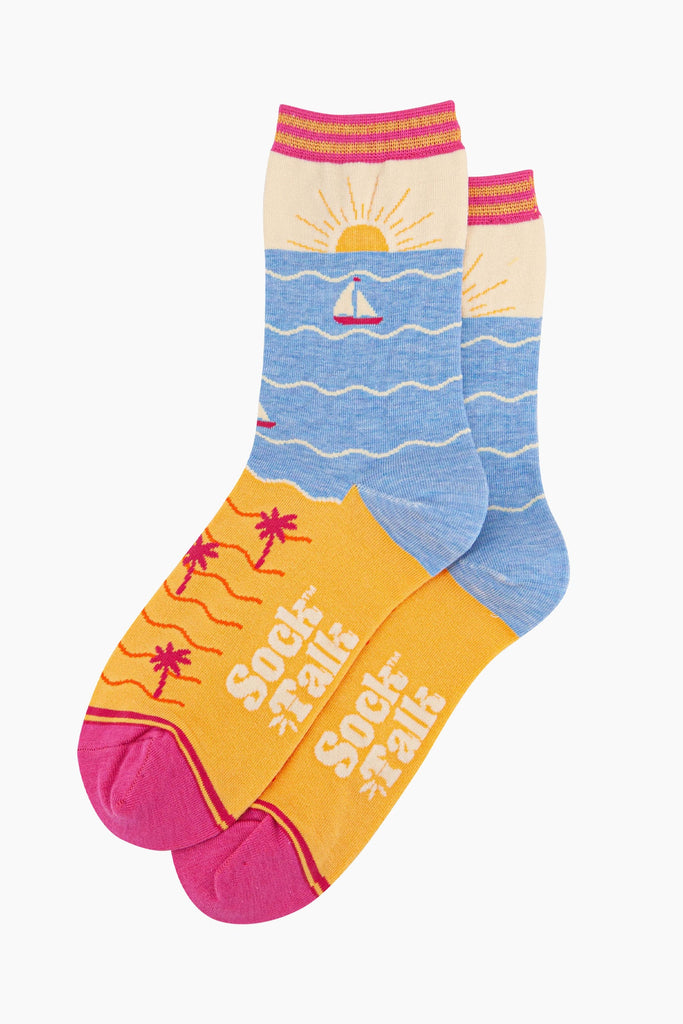 womens-bamboo-socks-cream-blue-beach-sunset-laying-flat-sunset-beach-pattern-covers-the-whole-design