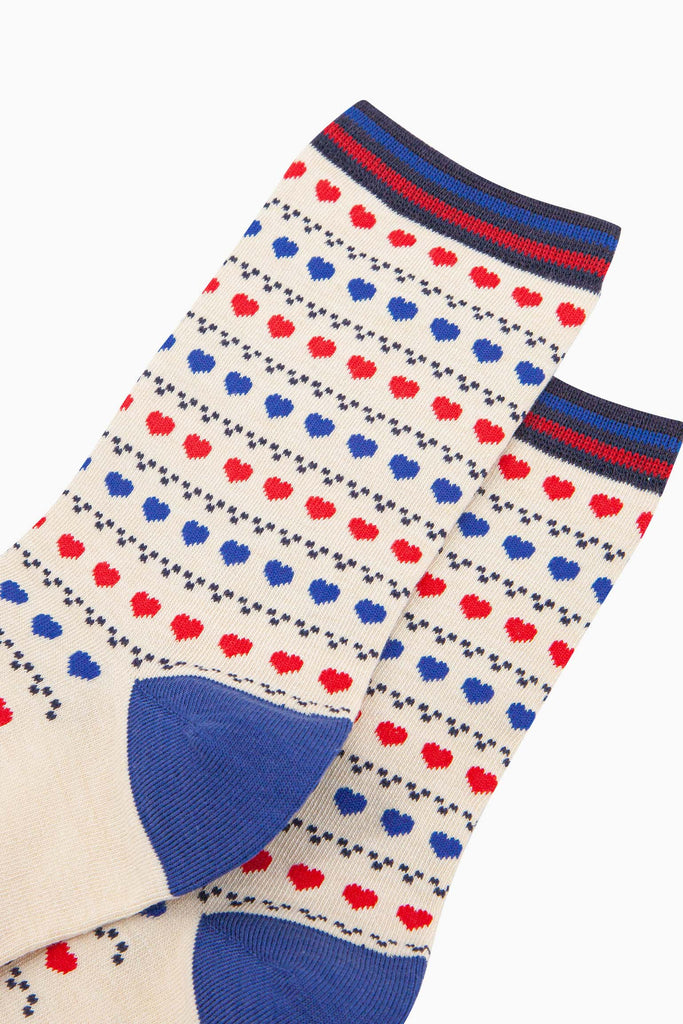 womens-bamboo-socks-cream-red-blue-heart-fair-isle-close-up-showing-red-and-blue-love-hearts-in-rows-separated-by-fair-isle-dots