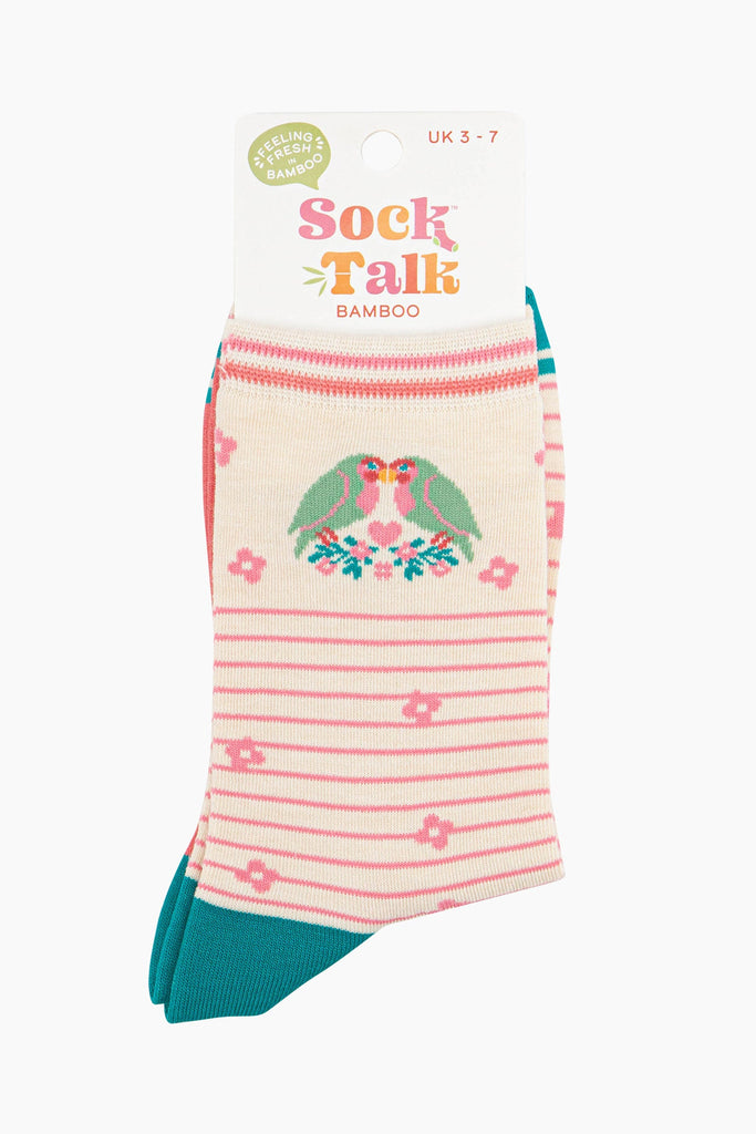 cream lovebird striped socks in  their sock talk packaging. The socks are a uk size 3-7.