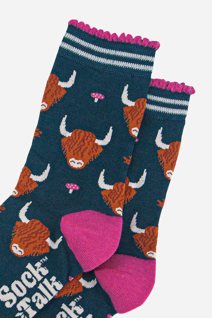 womens-bamboo-socks-forest-green-cream-highland-cow-leaves-close-up