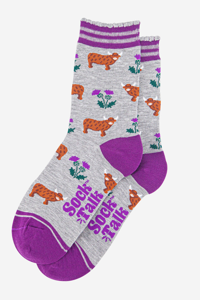 womens-bamboo-socks-light-grey-purple-highland-cow-thistles-laying-flat