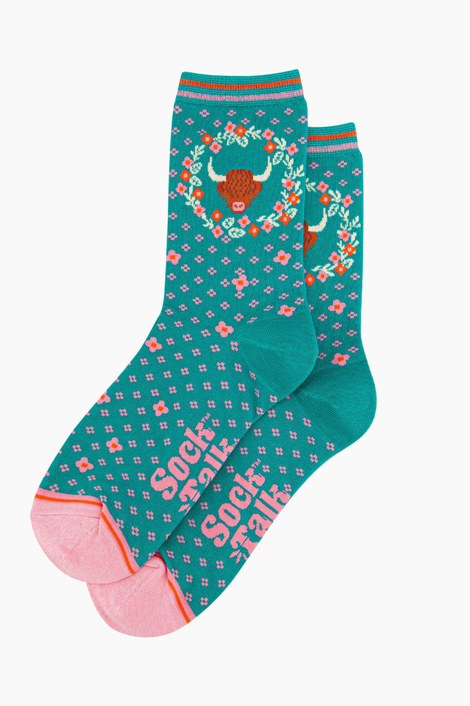 womens-bamboo-socks-teal-highland-cow-floral-wreath-laying-flat-summery-flower-pattern-scottish-coo