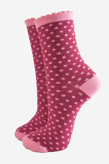 dark berry pink ankle socks with an all over pattern of small red polka dots