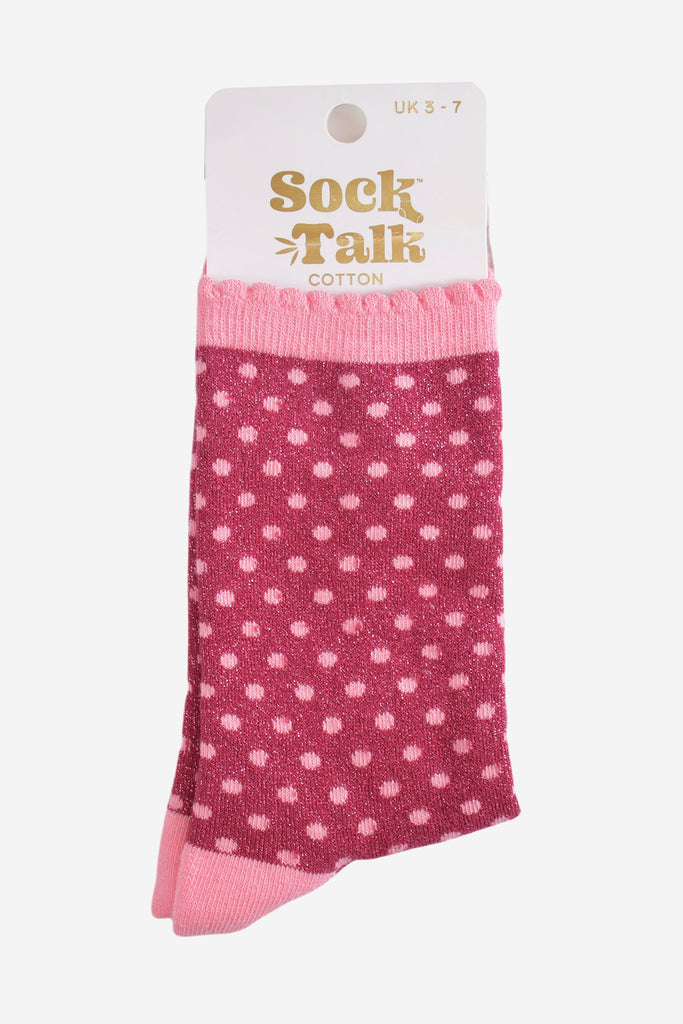 berry and small pink polka dot glitter socks in their sock talk packaging, these socks are a uk size 3-7
